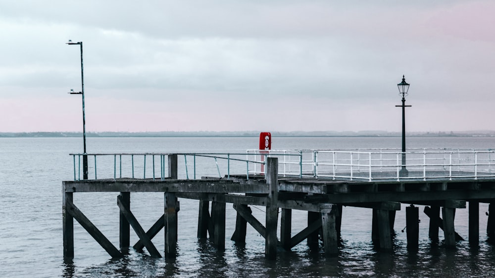 a pier with a sign on it