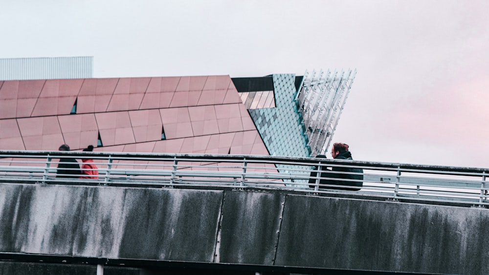 a group of people standing on a roof