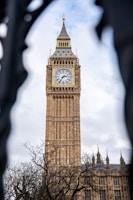 A refined image capturing the classic silhouette of Big Ben against a sterling silver morning light.