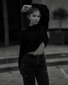 A model wearing a high-quality sweater in an urban setting.