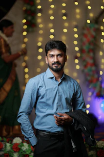 Close-up of hands holding a stylish jacket bought from Bluevista.