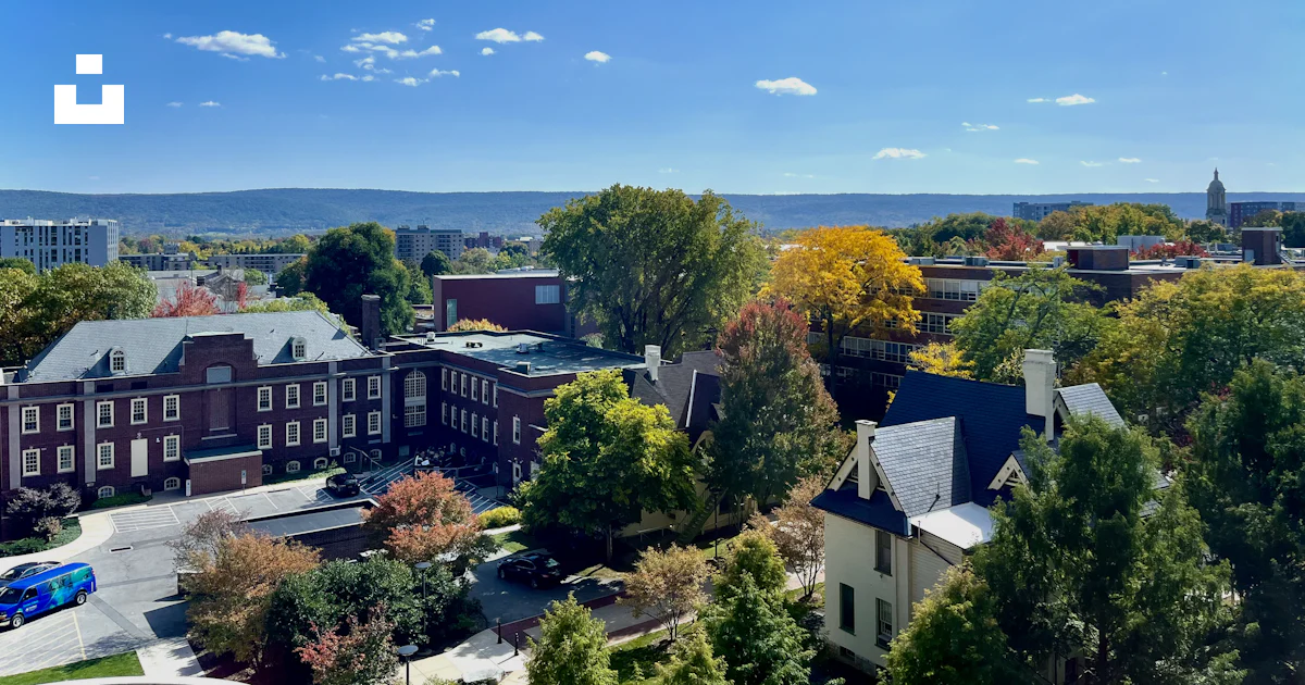 Free State Collage A city with trees and buildings photo – Free State college Image on ...