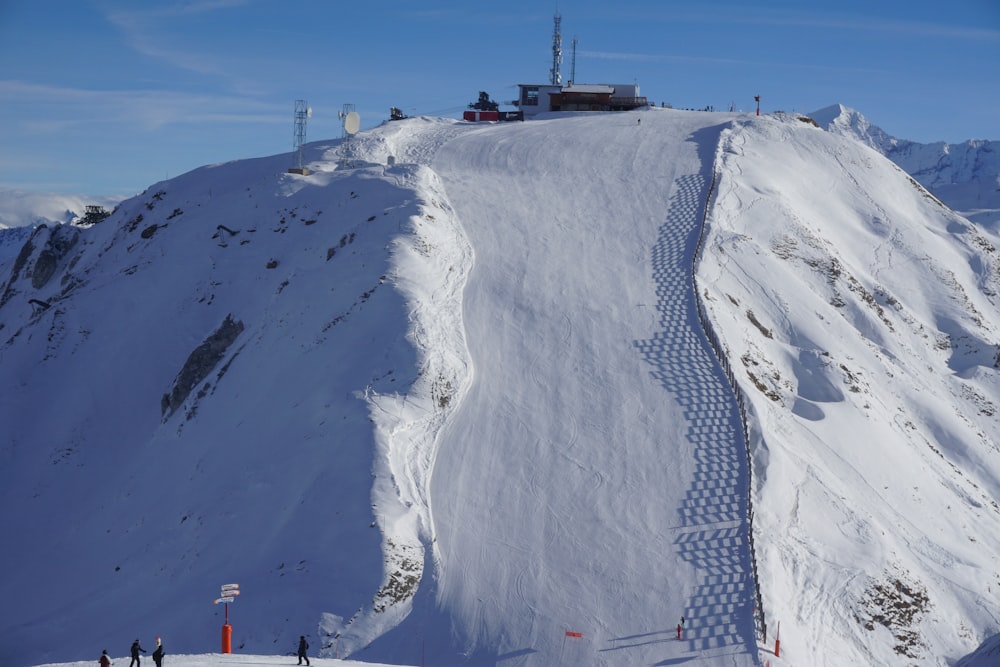 a long line of snow on a mountain