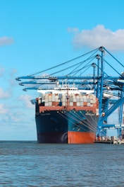 a large cargo ship at a dock