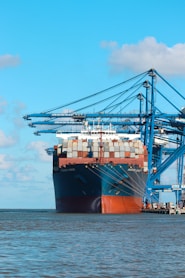 a large cargo ship at a dock