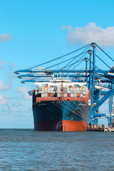 a large cargo ship at a dock