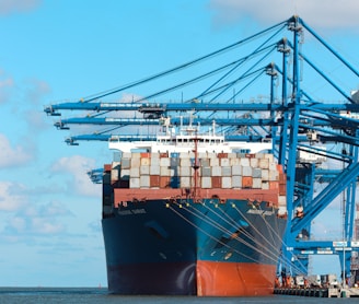 a large cargo ship at a dock