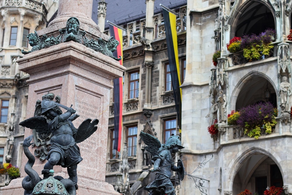 a statue in front of a building