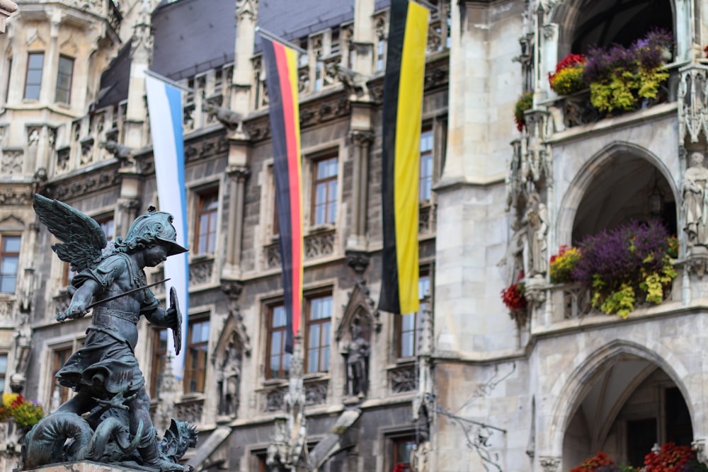 a statue in front of a building