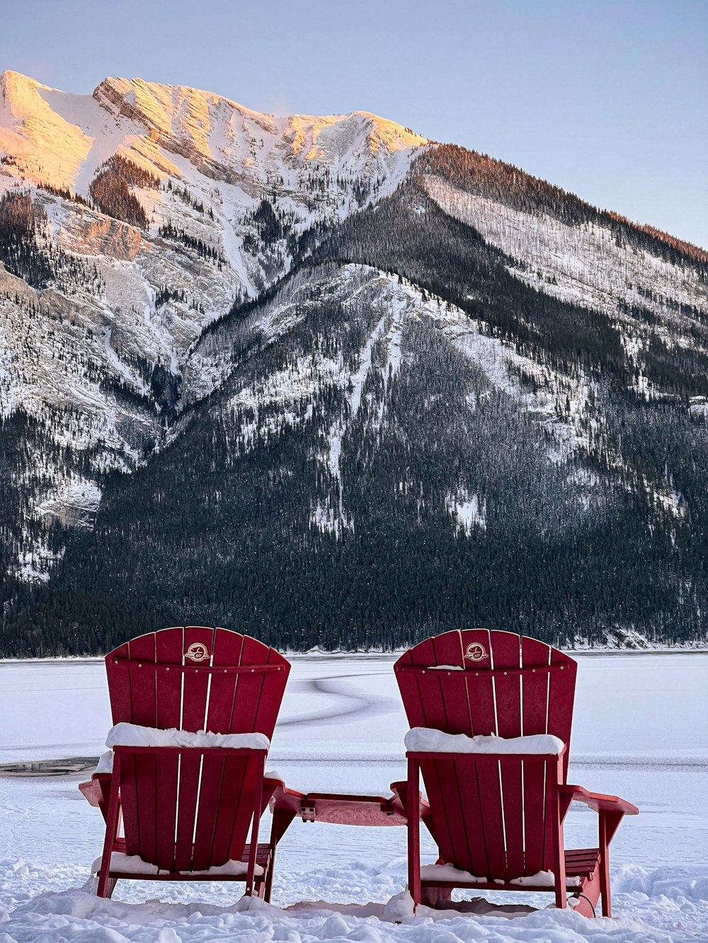 red chairs in the snow