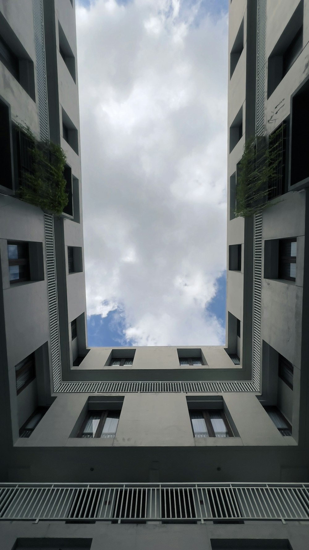 a building with a cloudy sky