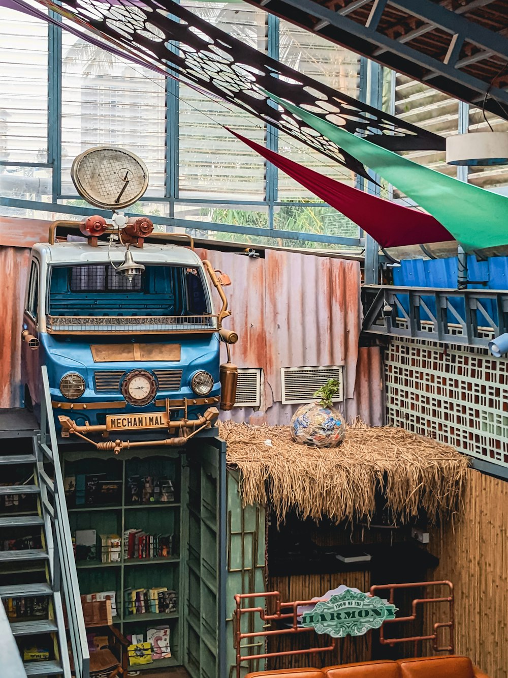 a blue truck in a warehouse