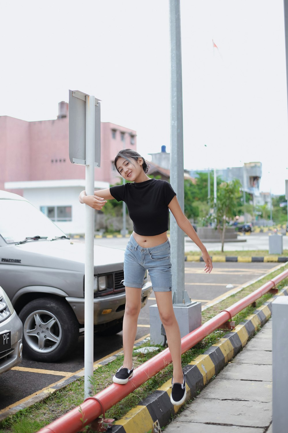 a person standing on a street corner