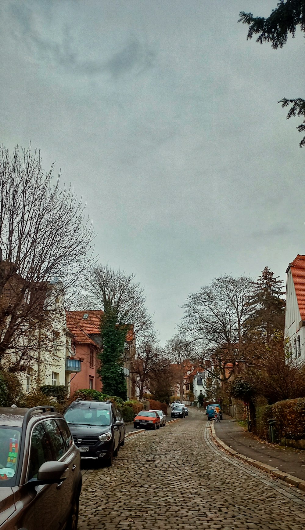 a street with cars parked along it