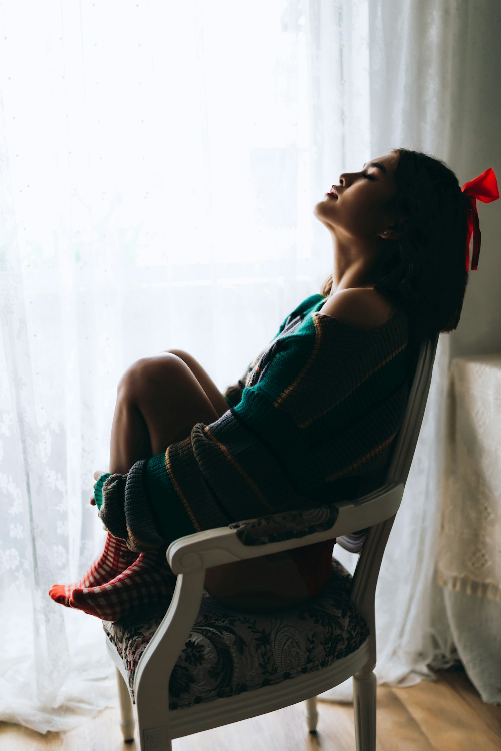 a woman sitting in a chair