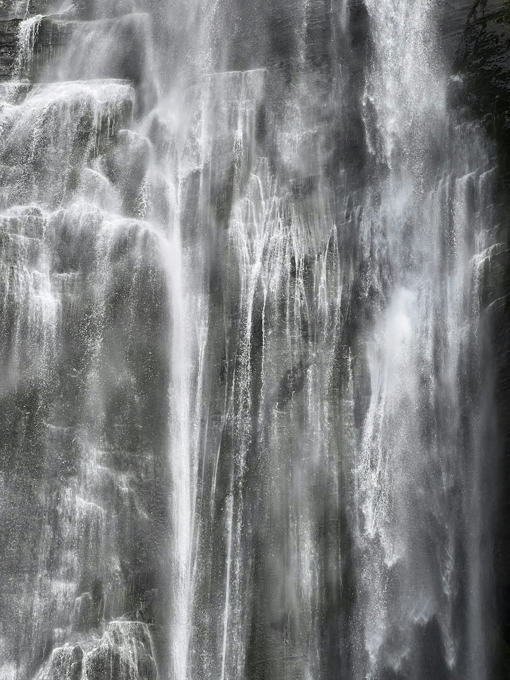 a waterfall with a black background