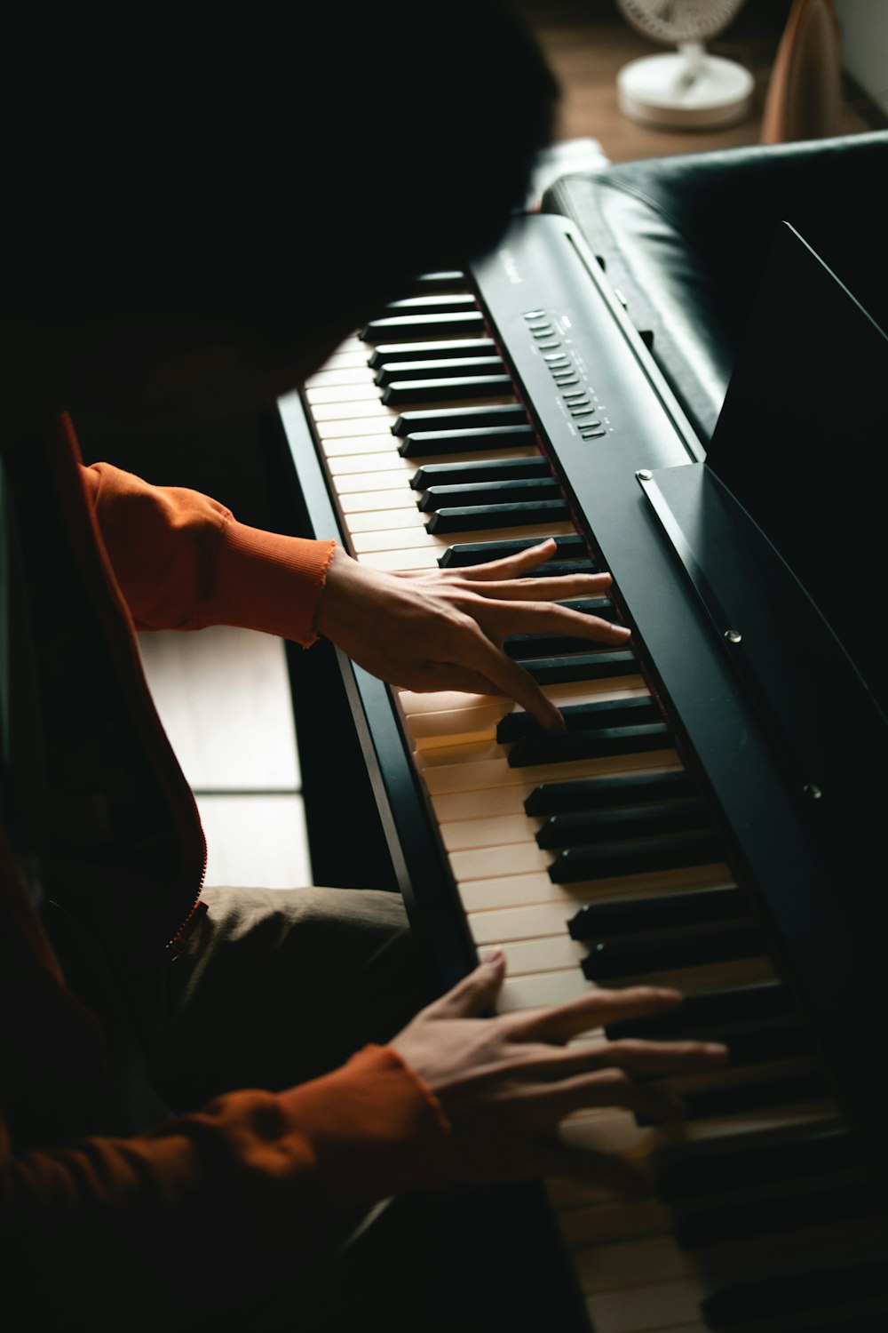 a person playing a piano