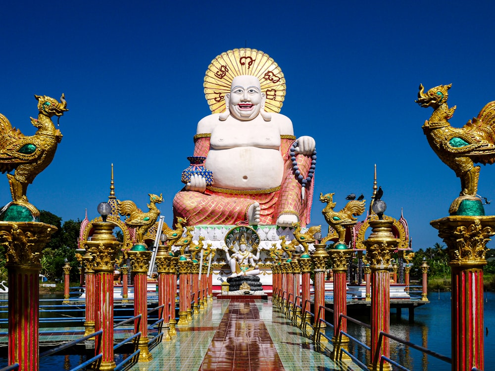 a large statue of a person with a crown and a crown