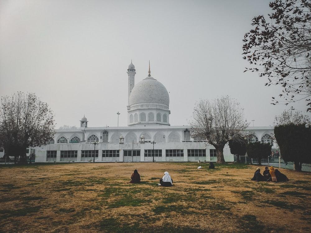 a large white building with a dome