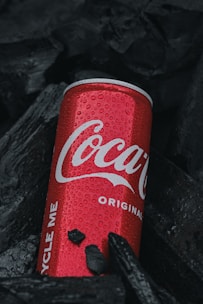 Packaged activated carbon products ready for shipment with red elegant branding.