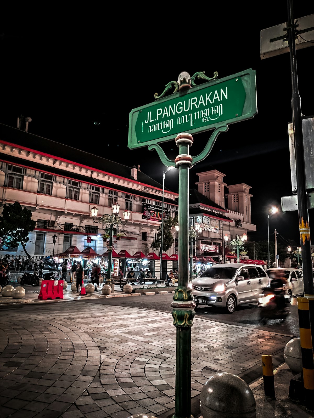 Prawirotaman Yogyakarta — Malioboro street sign at night in the arts district