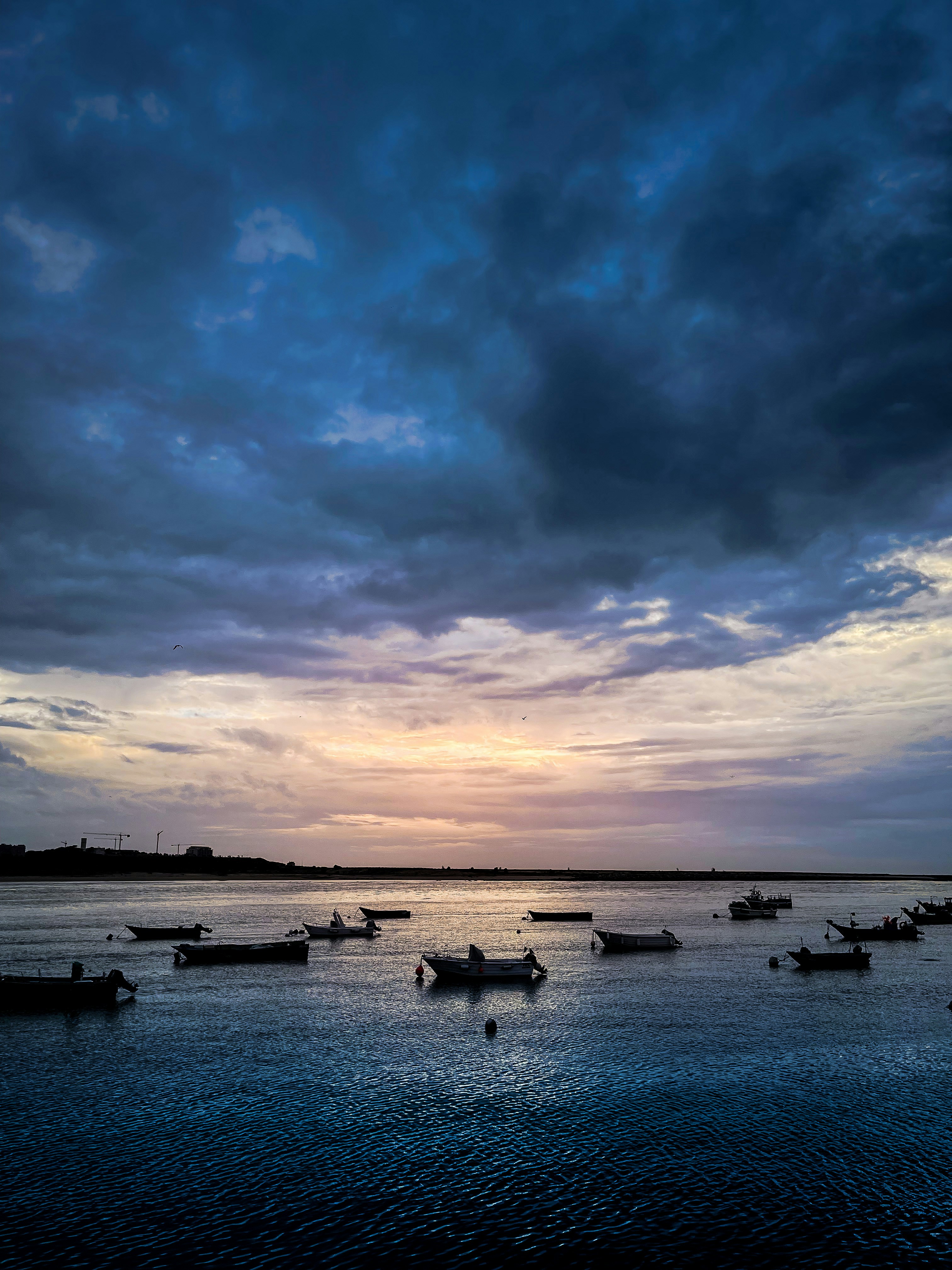 a group of boats in a body of water