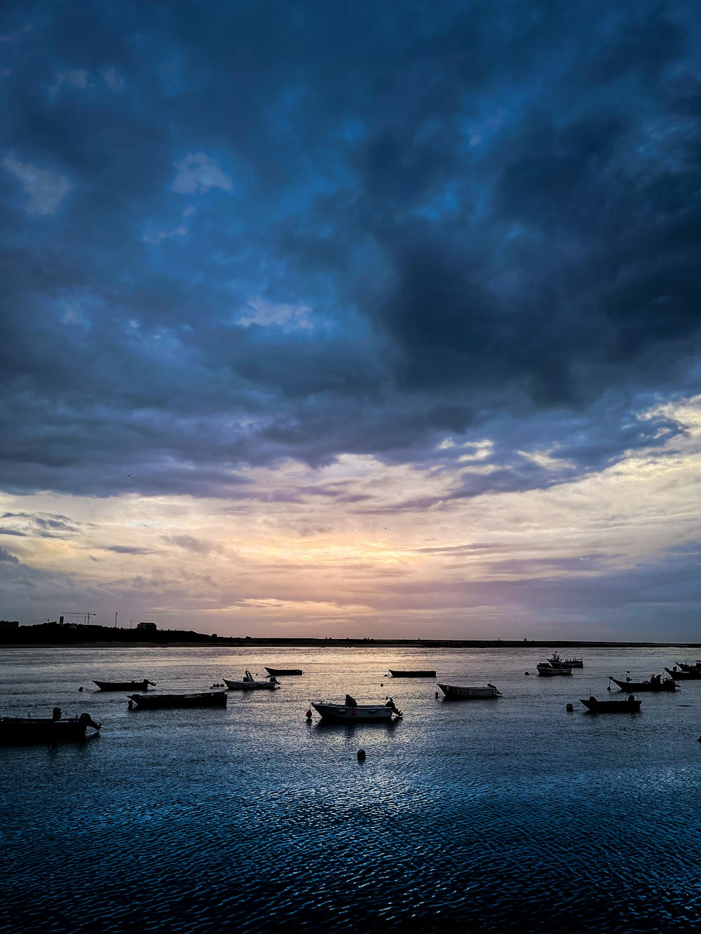 a group of boats in a body of water