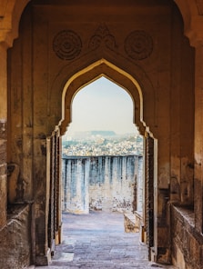 a doorway with a view of a city