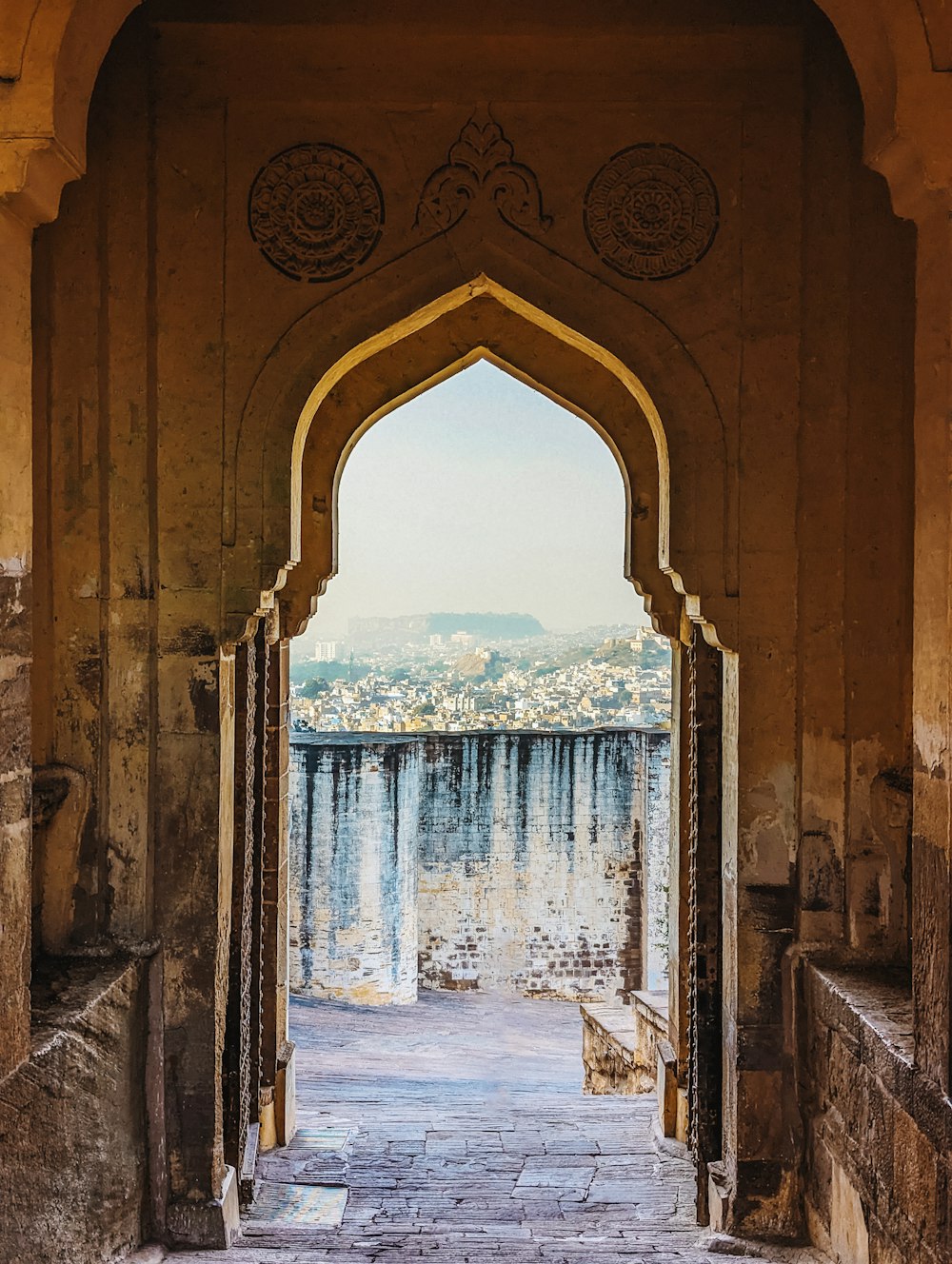 a doorway with a view of a city