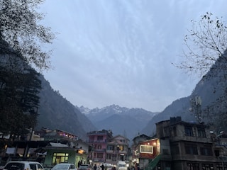 a city with mountains in the background