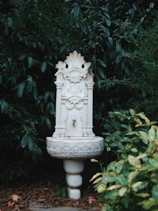 An elegant indoor fountain made from Makrana white marble, adding serenity to any space.