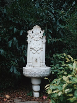 An elegant water feature surrounded by natural stones.