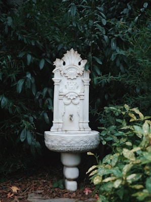 An elegant indoor fountain made from Makrana white marble, adding serenity to any space.