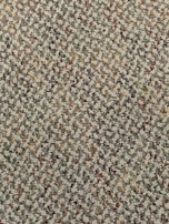 Close-up of textured flooring showing intricate patterns created from recycled plastics.