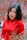 a woman in a red shirt