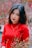a woman in a red shirt