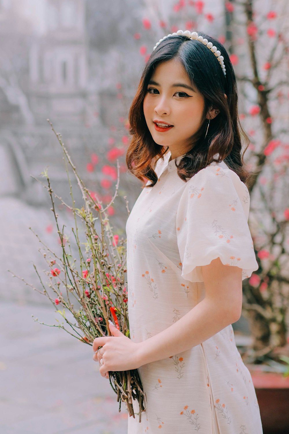 a person holding a flower