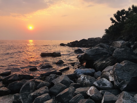 A picturesque sunset over the coastal horizon.