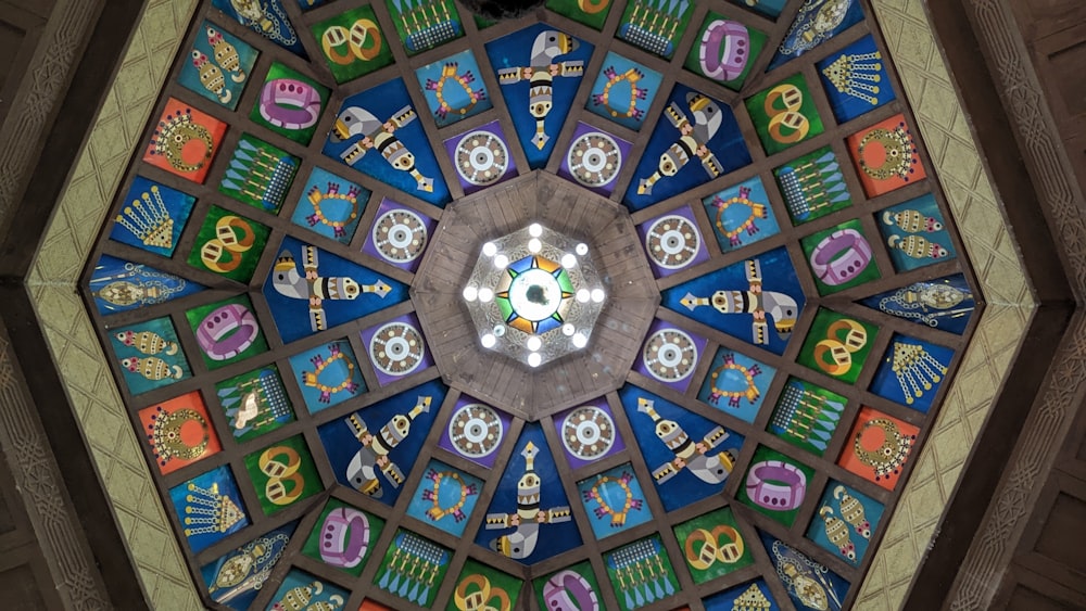 a colorful ceiling with a circular design