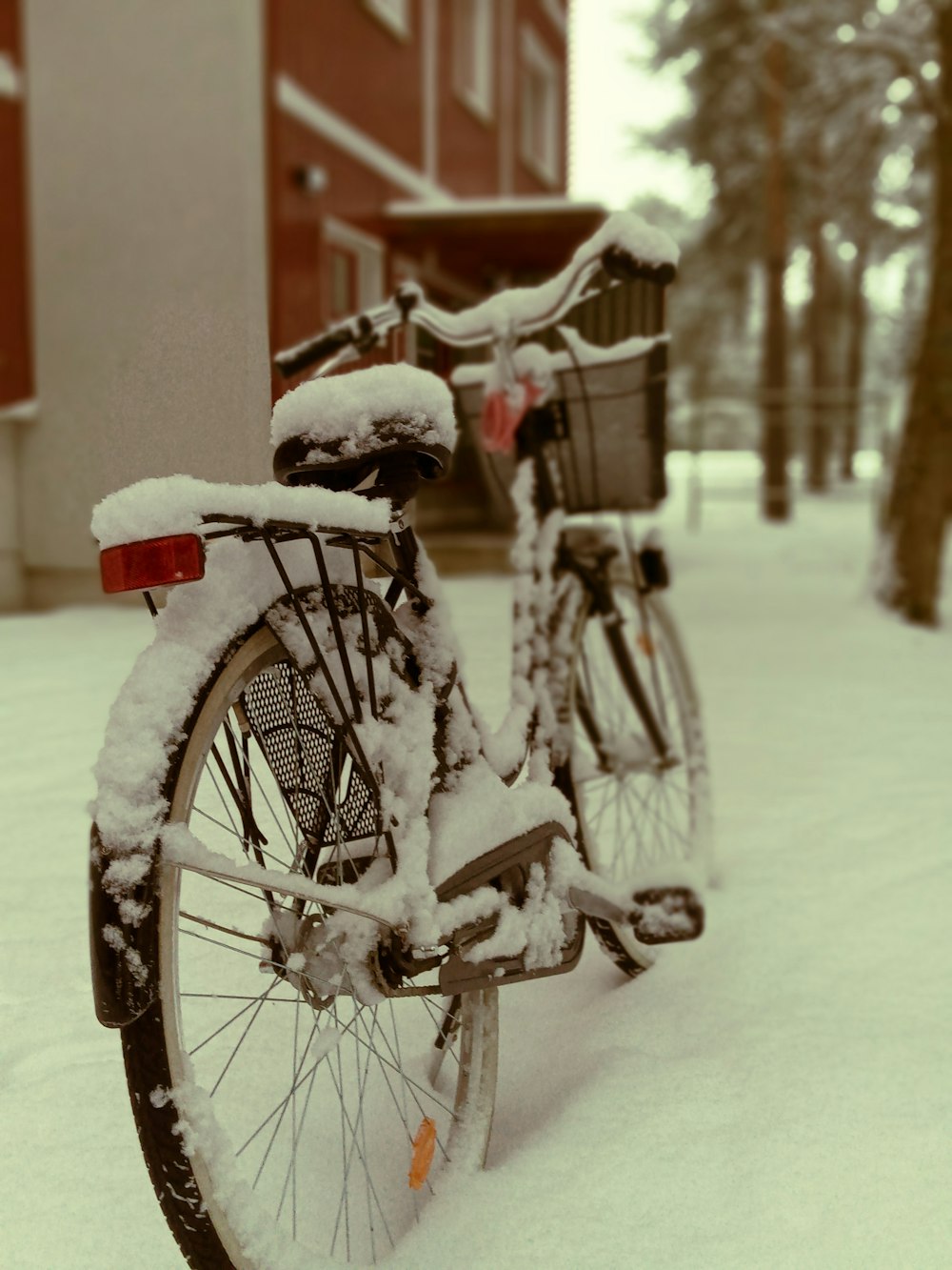 a bicycle with a basket on the back