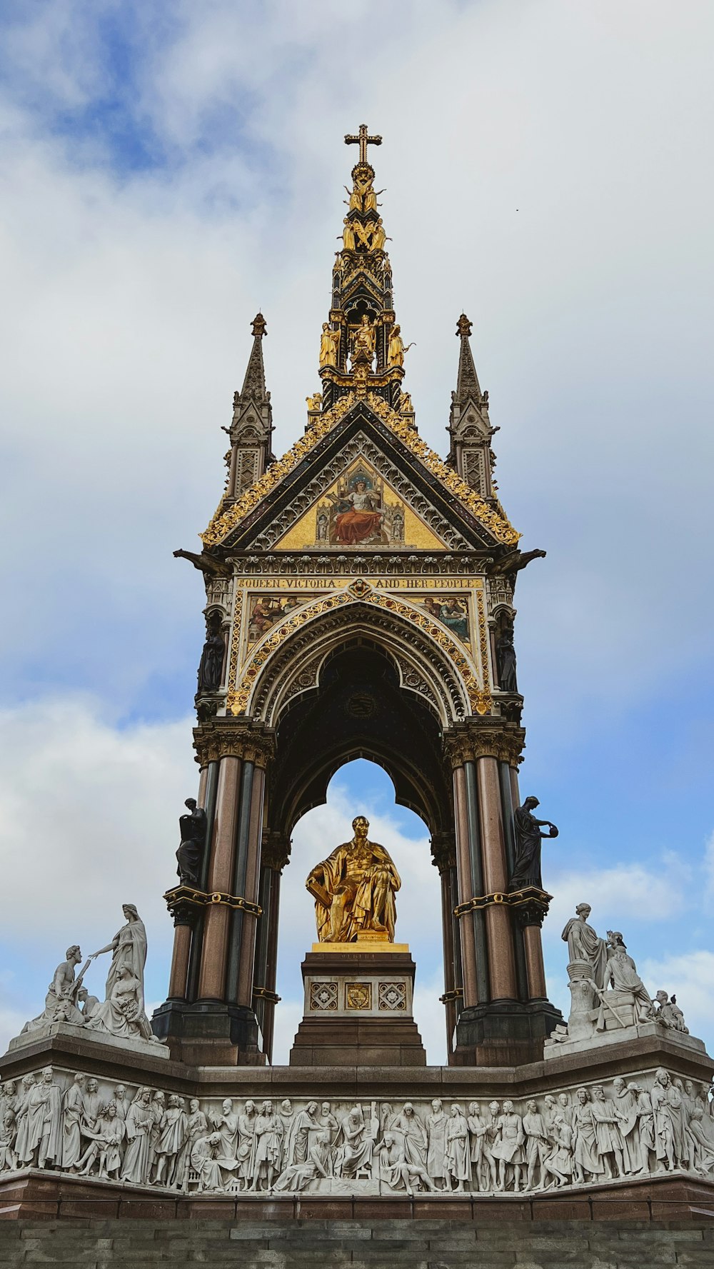 a building with statues on the outside