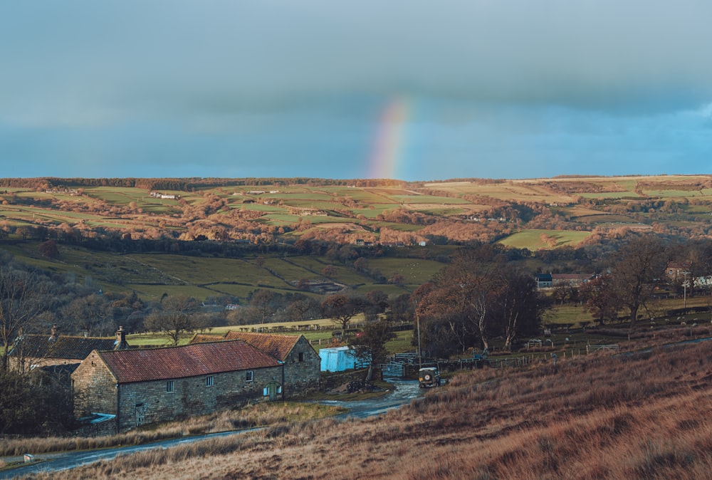 a rainbow over a small town