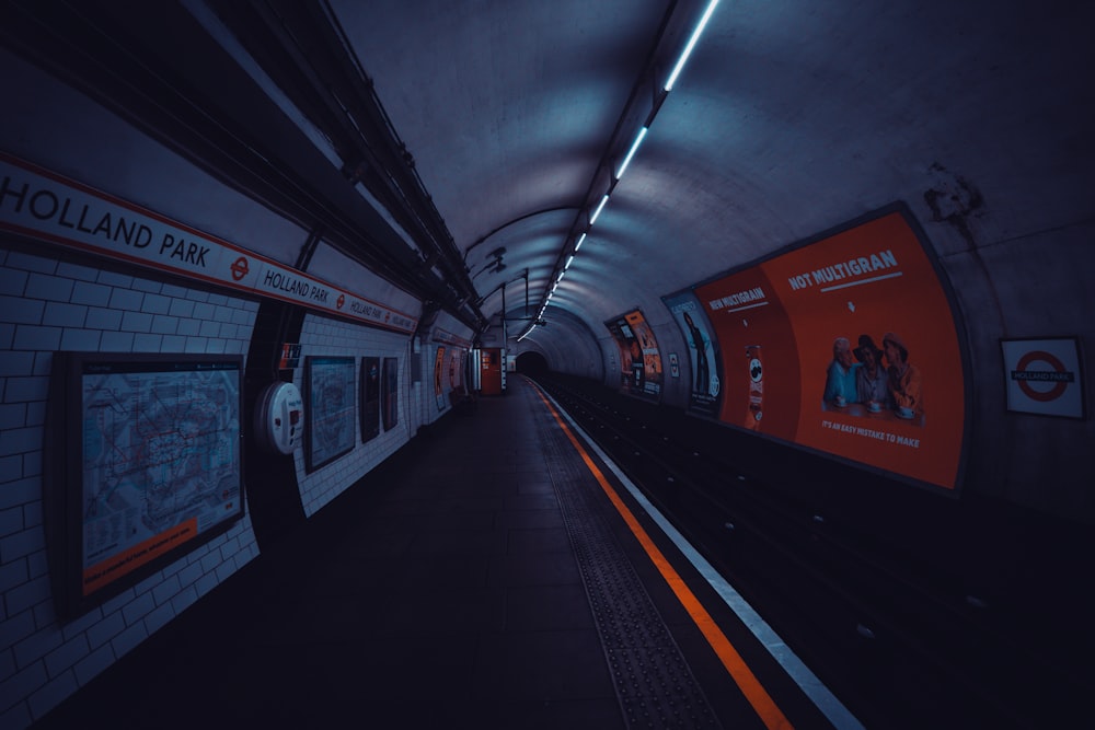 a subway station with a train