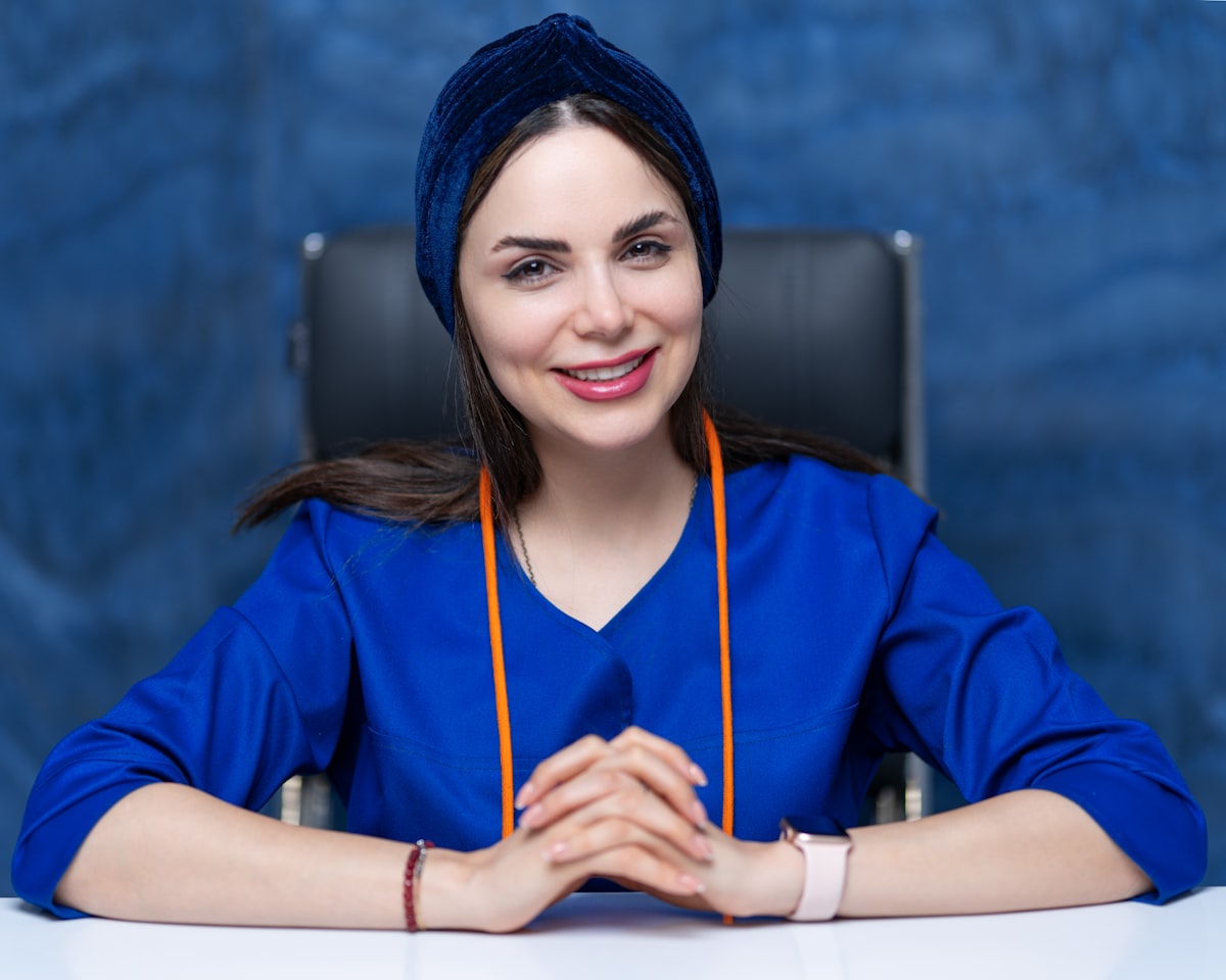 Mental health professional in a calm counseling setting where AI note tools support psychiatric nursing in 2026