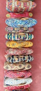 A vibrant display of colorful shoes on a wooden floor.