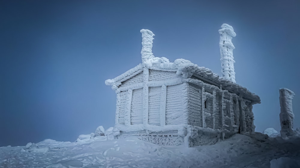 a large stone building with snow on the ground