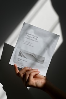 a person holding a piece of paper