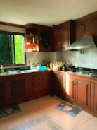 A clean and organized kitchen with natural light.