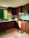 A happy family enjoying their newly remodeled kitchen with bright natural light.