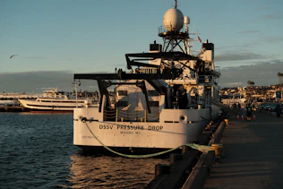 a boat docked at a pier